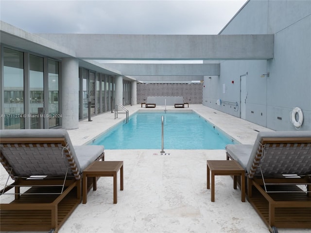 view of pool with a patio