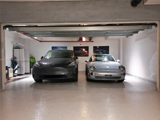 garage featuring a garage door opener