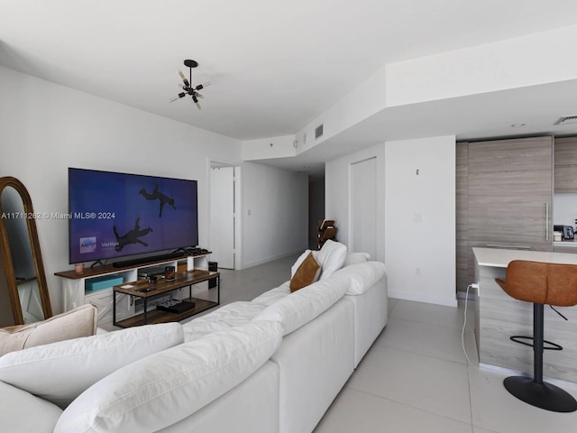 tiled living room featuring tile walls