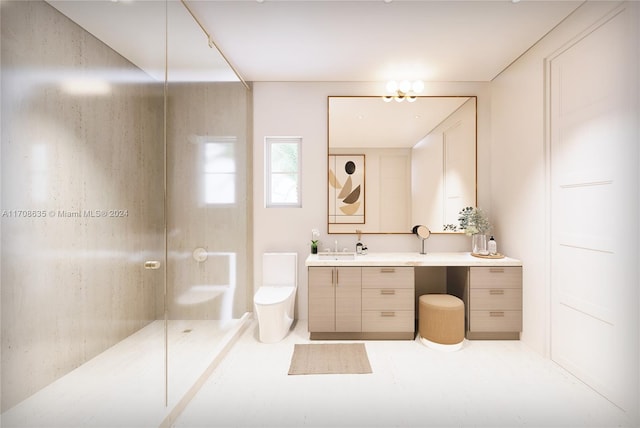 bathroom with vanity, toilet, and a shower