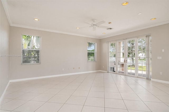 unfurnished room with ceiling fan, light tile patterned flooring, ornamental molding, and french doors