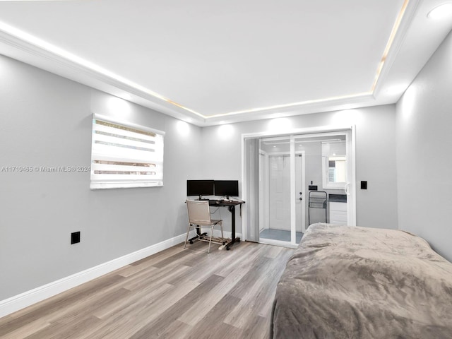 bedroom with light wood-type flooring