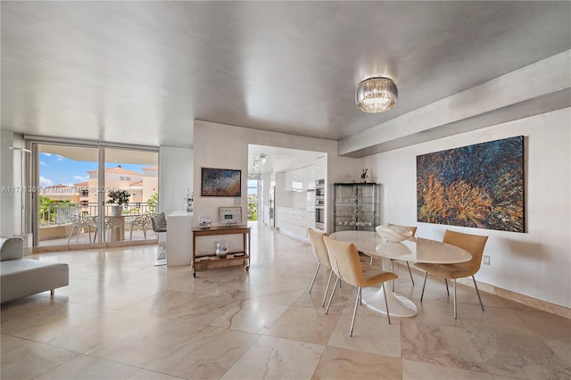 dining space with expansive windows