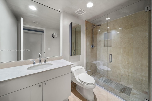 bathroom featuring an enclosed shower, tile patterned flooring, toilet, and vanity