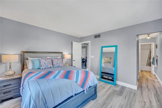 bedroom featuring light wood-type flooring