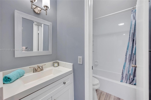 full bathroom featuring vanity, toilet, and shower / bathtub combination with curtain