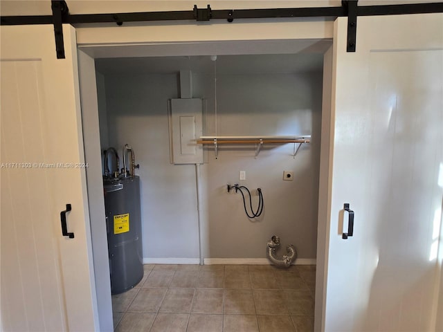 laundry room with hookup for an electric dryer, washer hookup, water heater, light tile patterned floors, and electric panel