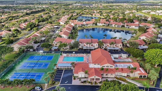 drone / aerial view with a water view