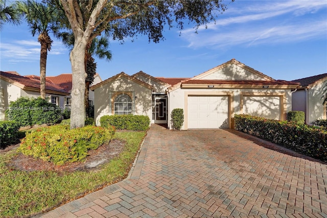 view of front of house with a garage