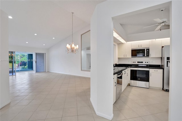 kitchen with white cabinetry, stainless steel appliances, lofted ceiling, decorative light fixtures, and ceiling fan with notable chandelier