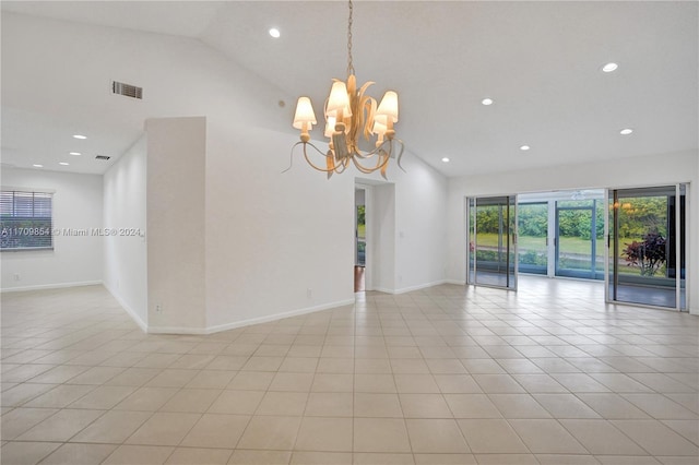 unfurnished room featuring vaulted ceiling, a notable chandelier, and light tile patterned flooring