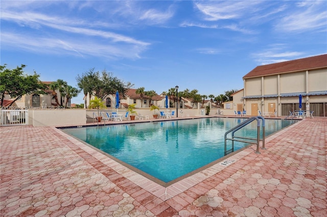 view of swimming pool featuring a patio