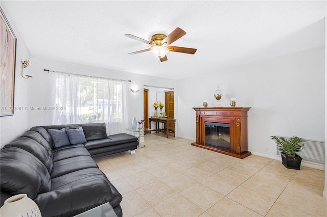 living room featuring light tile patterned floors and ceiling fan