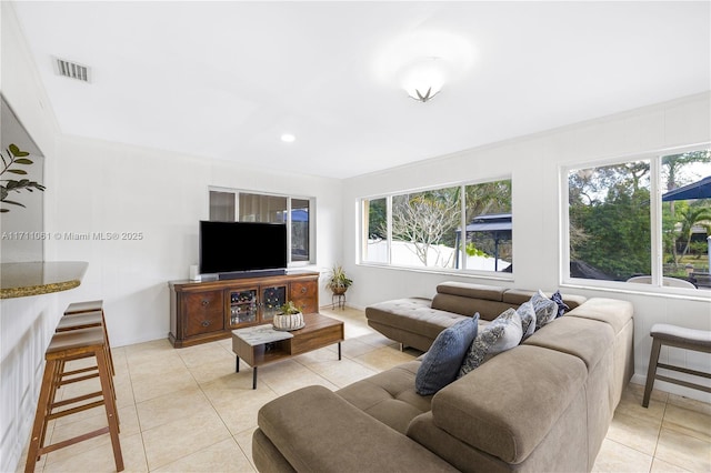 living room featuring light tile patterned flooring