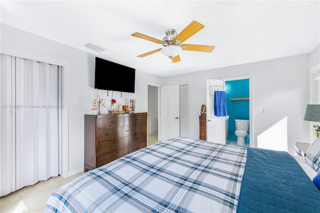 bedroom with ceiling fan and light tile patterned floors