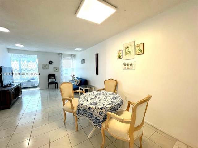 dining room with light tile patterned flooring