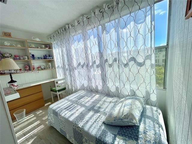 bedroom featuring a textured ceiling