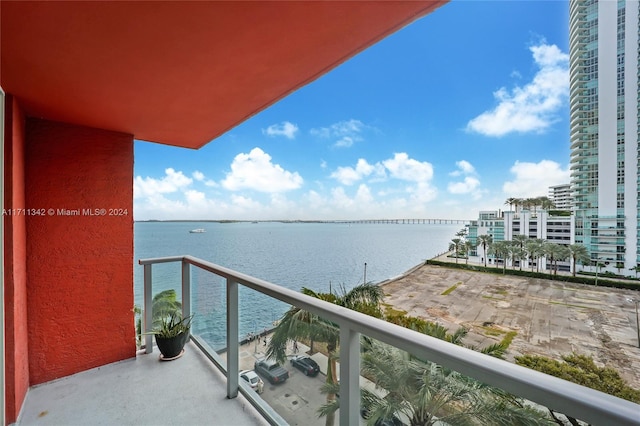 balcony featuring a water view