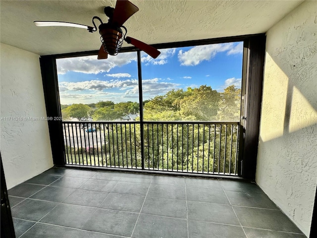 balcony featuring ceiling fan