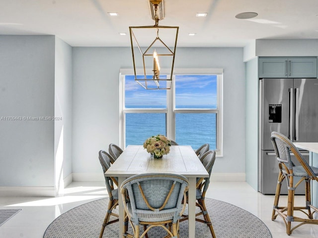 dining room with a water view