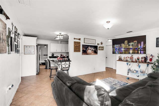 tiled living room featuring crown molding