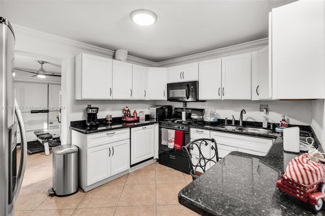 kitchen featuring white cabinetry, sink, dark stone countertops, crown molding, and black appliances