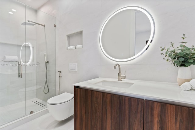 bathroom featuring vanity, a shower with shower door, tile walls, and toilet