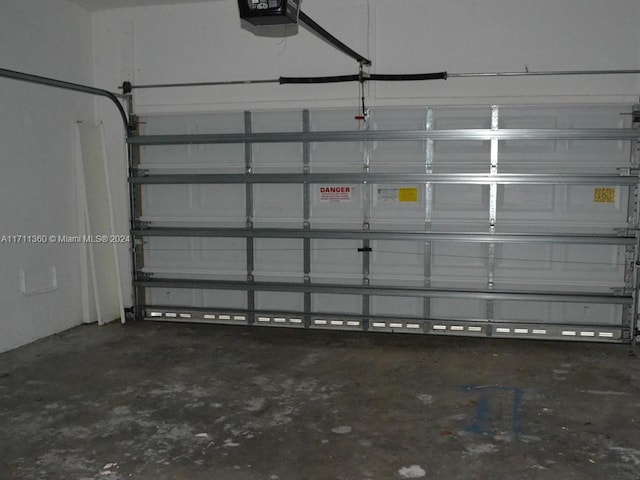 garage featuring a garage door opener