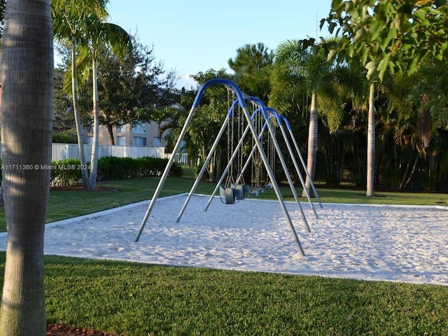 view of jungle gym featuring a yard