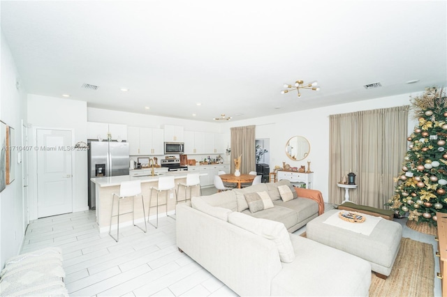 living room featuring sink