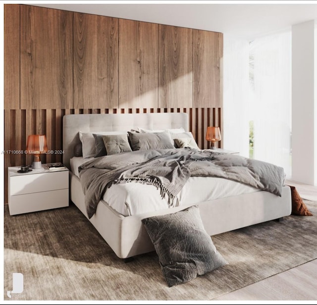 bedroom featuring hardwood / wood-style floors