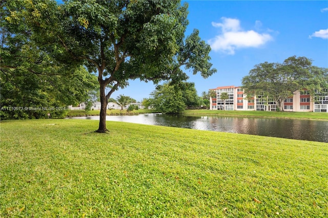 view of yard with a water view