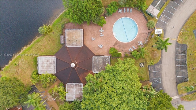 birds eye view of property featuring a water view