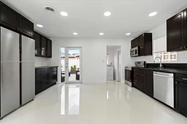 kitchen with french doors, stainless steel appliances, and sink