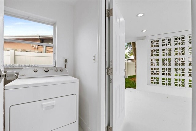 washroom featuring washer / clothes dryer