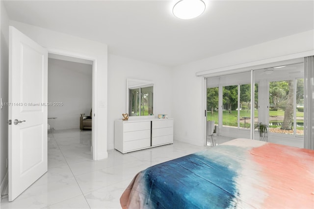 7584 Red Ruby Dr, Delray Beach, FL 33446 - bedroom with light marble finish flooring, access to outside, and baseboards