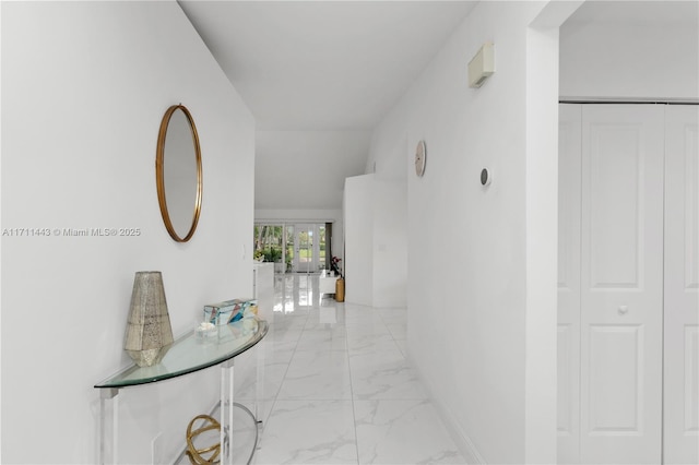 7584 Red Ruby Dr, Delray Beach, FL 33446 - corridor featuring light marble finish floors
