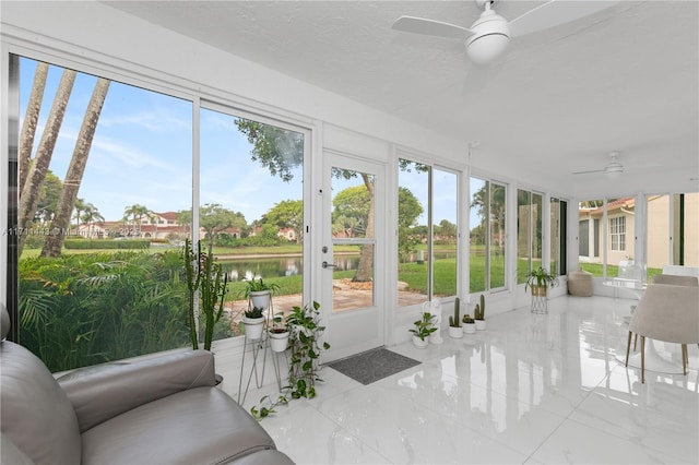 7584 Red Ruby Dr, Delray Beach, FL 33446 - sunroom / solarium featuring a ceiling fan, plenty of natural light, and a water view