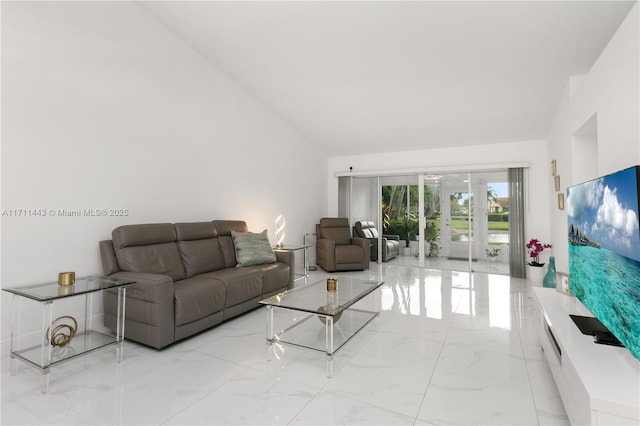 7584 Red Ruby Dr, Delray Beach, FL 33446 - living area with marble tiled flooring, vaulted ceiling, and french doors