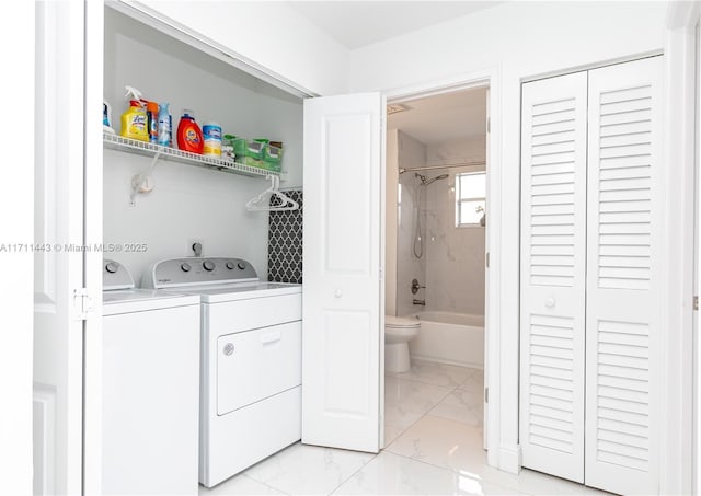 7584 Red Ruby Dr, Delray Beach, FL 33446 - laundry area with separate washer and dryer and light marble finish floors