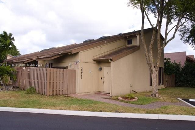 exterior space with a yard