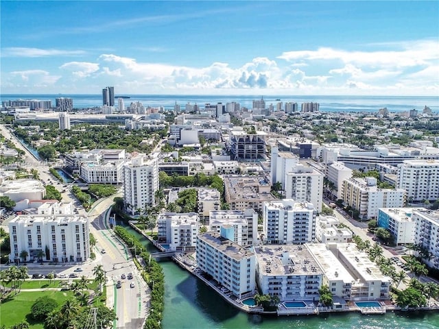 bird's eye view with a view of city and a water view