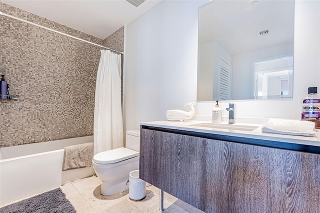 full bathroom featuring tile patterned floors, vanity, toilet, and shower / tub combo