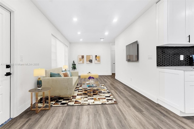 living room with hardwood / wood-style flooring