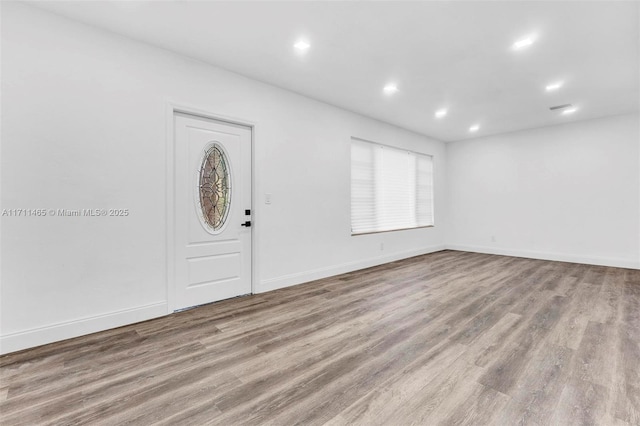 foyer with light wood-type flooring