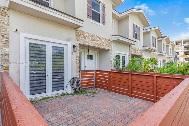 view of patio featuring french doors