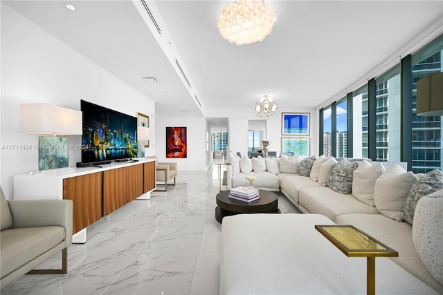 living room featuring a notable chandelier