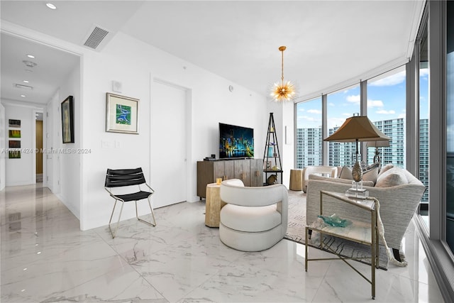 living room with floor to ceiling windows