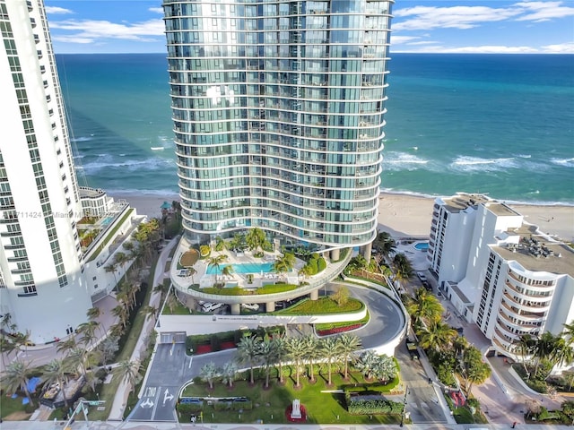 drone / aerial view with a view of the beach and a water view