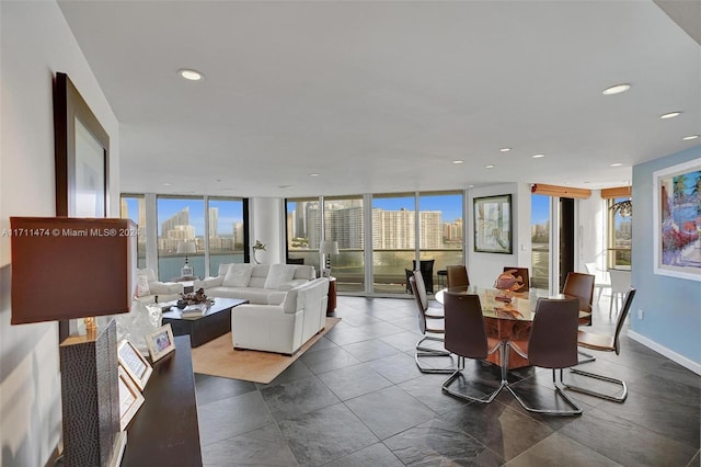 dining room featuring a wall of windows